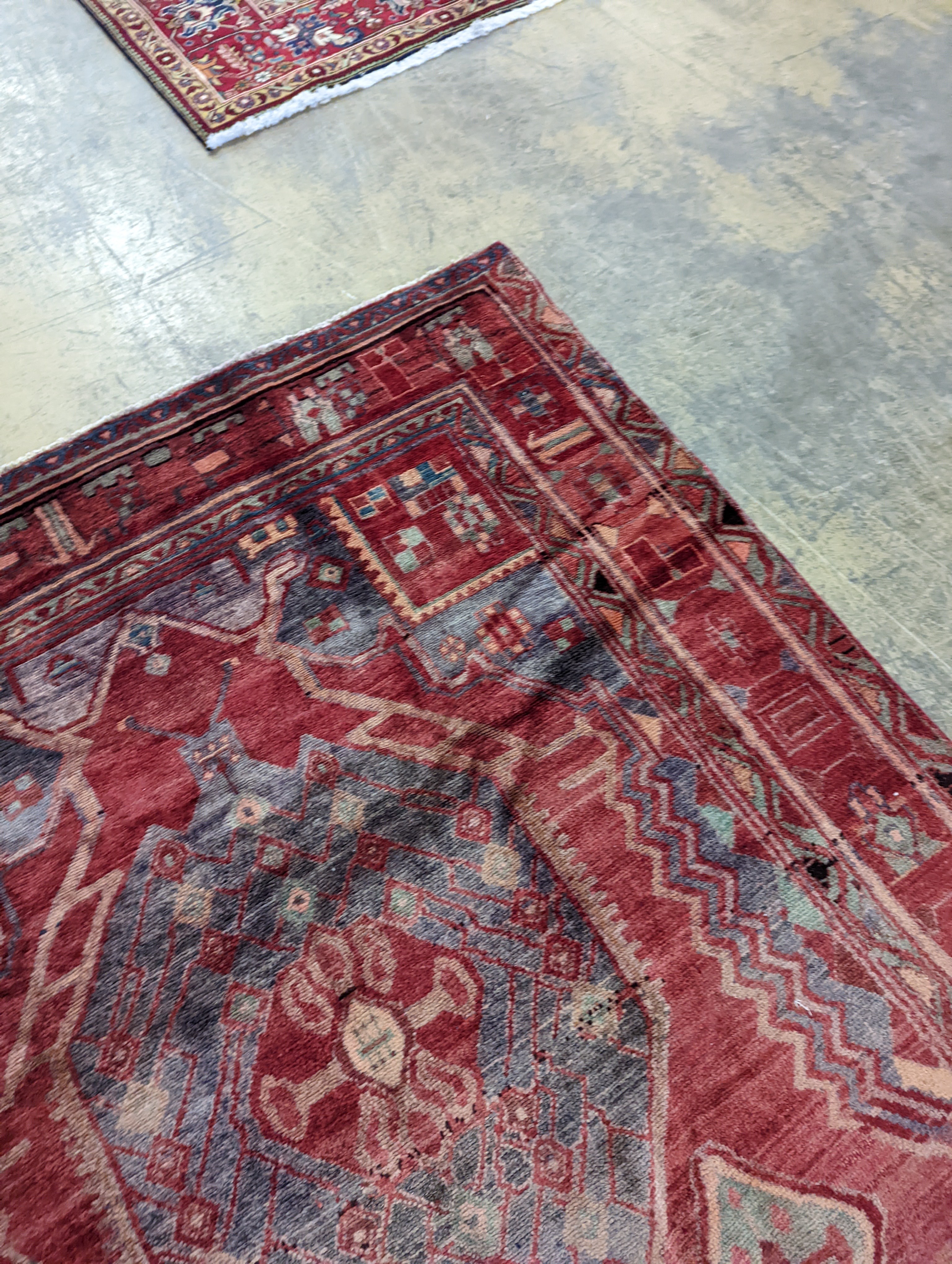 An Ardabil red ground carpet, 322 x 157cm